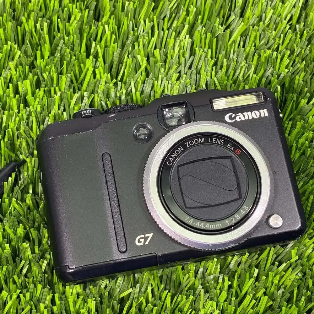 Canon PowerShot G7 10.0MP Digital Camera with Charger, Battery, and 4GB SD Card